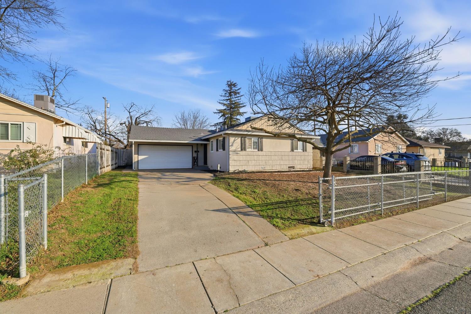 5674 Rio Verde Way North Highlands, CA 95660 - Photo 2 of 35 a house view with a outdoor space