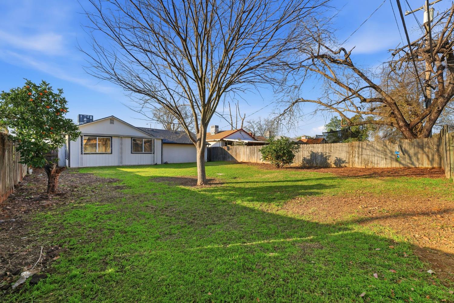 5674 Rio Verde Way North Highlands, CA 95660 - Photo 24 of 35 a view of a house with a backyard