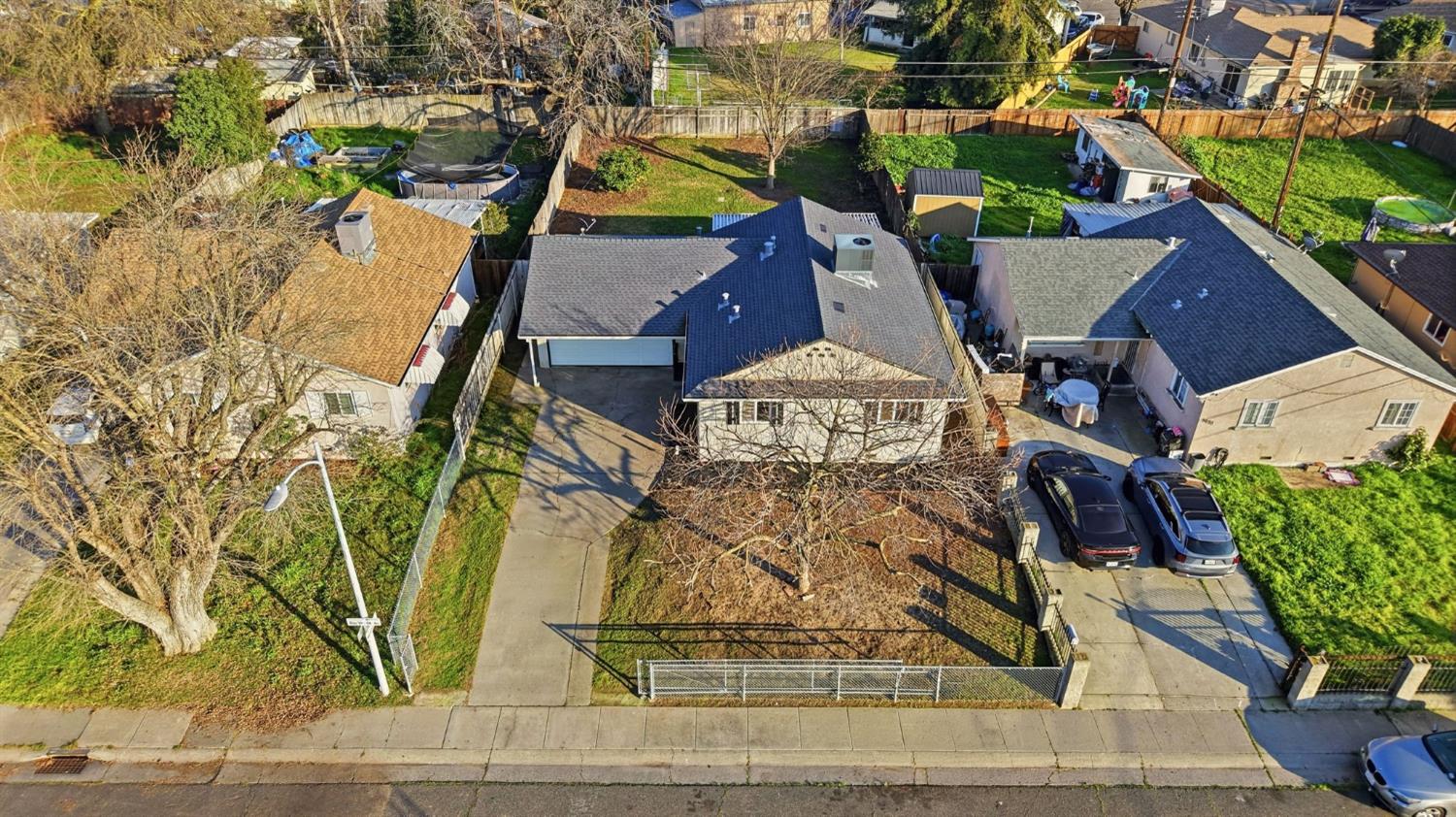 5674 Rio Verde Way North Highlands, CA 95660 - Photo 28 of 35 an aerial view of a house with a yard