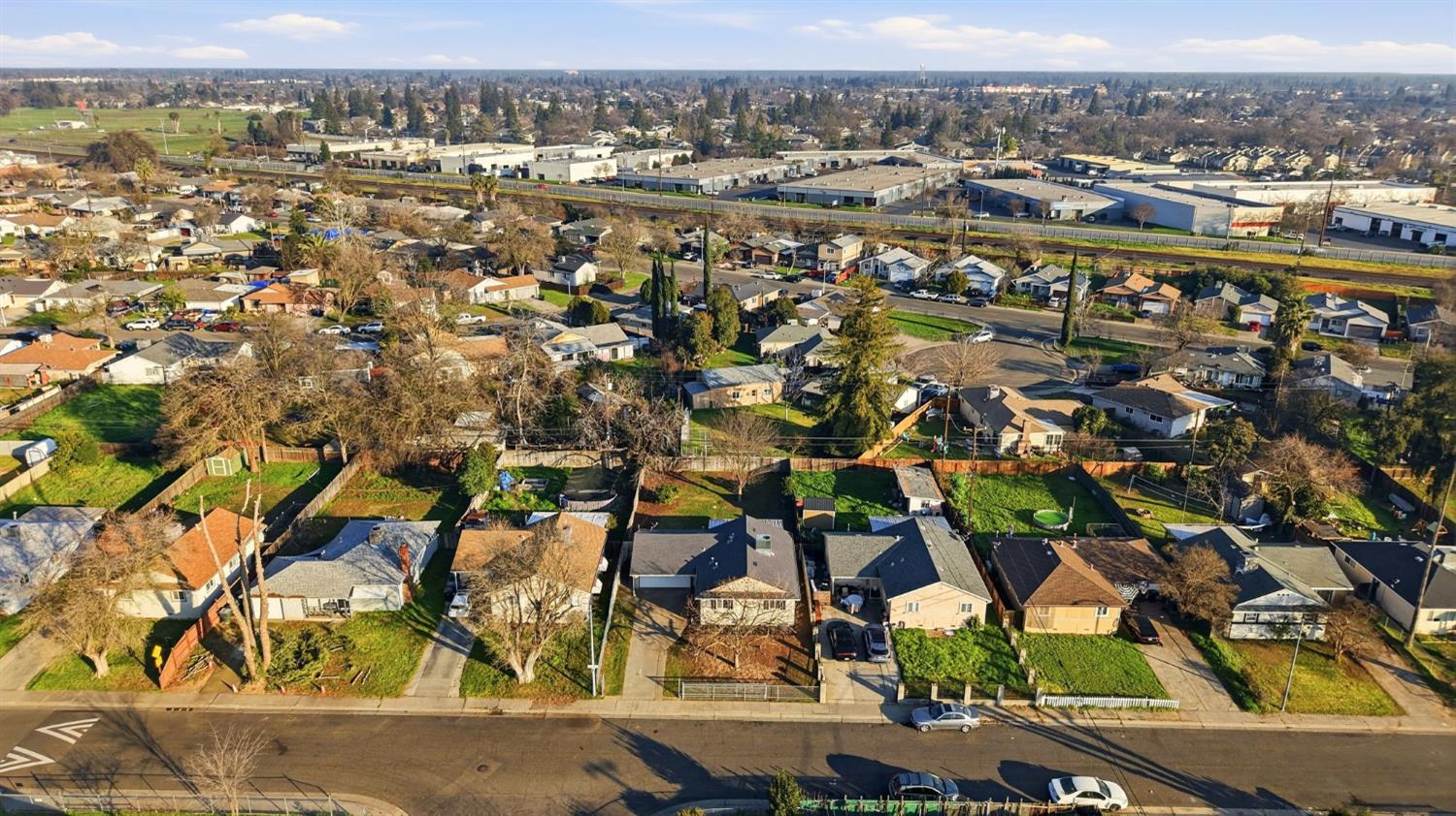 5674 Rio Verde Way North Highlands, CA 95660 - Photo 32 of 35 an aerial view of residential building and parking space