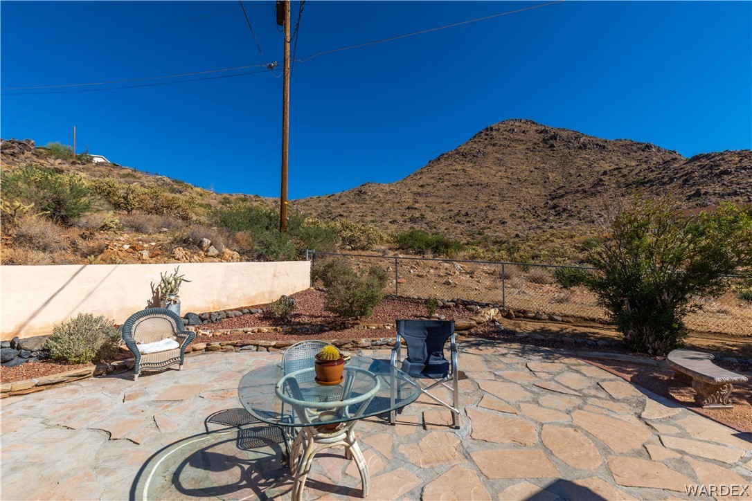 4214 Bluff Road Golden Valley, AZ 86413 - Photo 27 of 46 a view of a terrace with chairs