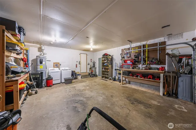 a view of a garage with clothes and shoes