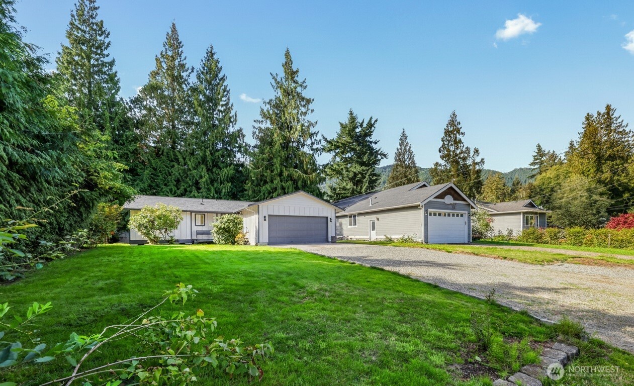 439 Fir Lane Sedro-Woolley, WA 98284 - Photo 29 of 29 a view of a house with a yard and green space