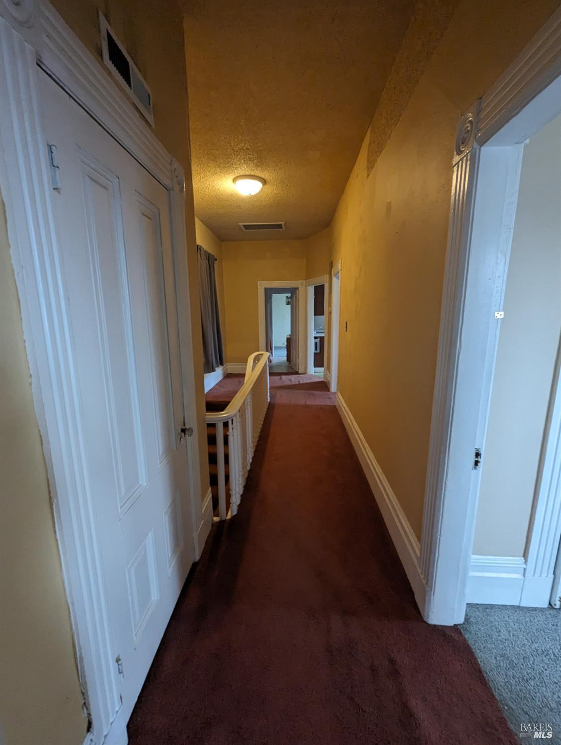 1547 4th Street, Unit A San Rafael, CA 94901 - Photo 25 of 64 a view of a hallway with windows