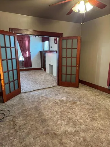 an empty room with windows