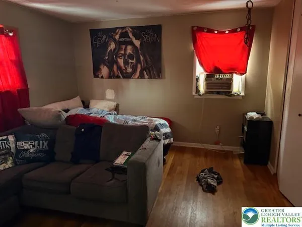 a bedroom with a bed and furniture