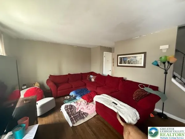 a living room with furniture and a couch