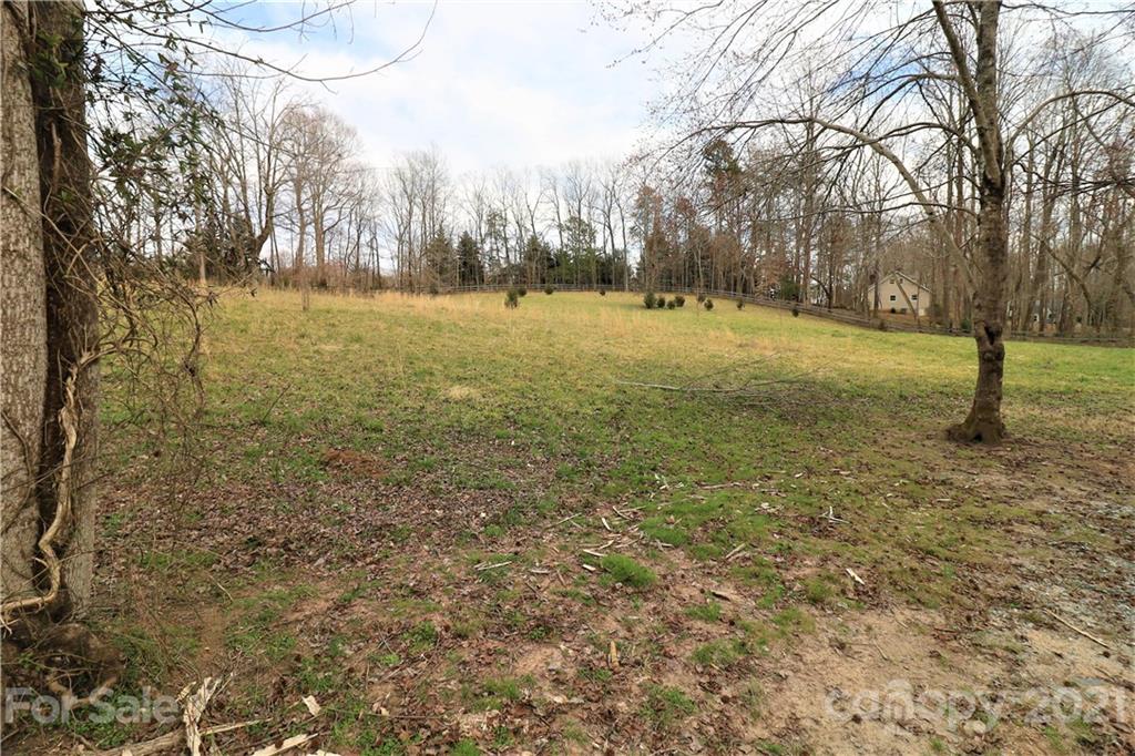 857 Red Fox Road Columbus, NC 28722 - Photo 3 of 6 a view of outdoor space with trees all around