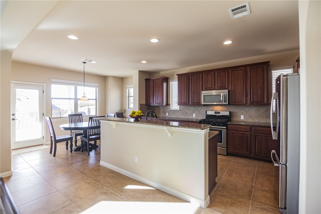 4284 Ridgebend Drive Round Rock, TX 78665 - Photo 1 of 1 Open kitchen/family room area