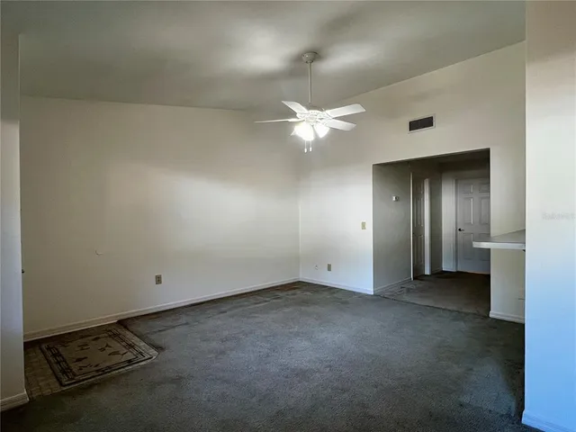 an empty room with a bathroom