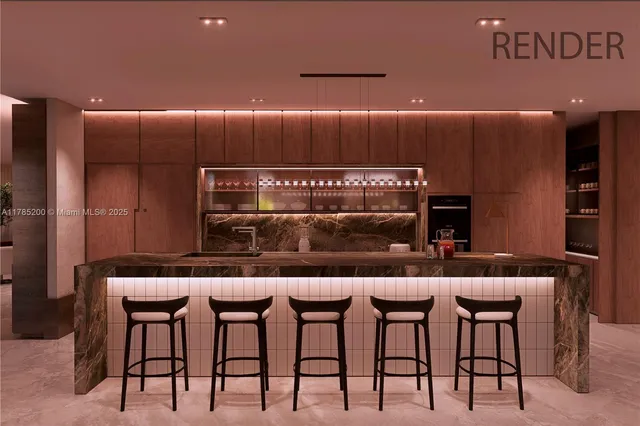 a kitchen with stainless steel appliances kitchen island granite countertop a refrigerator and a stove