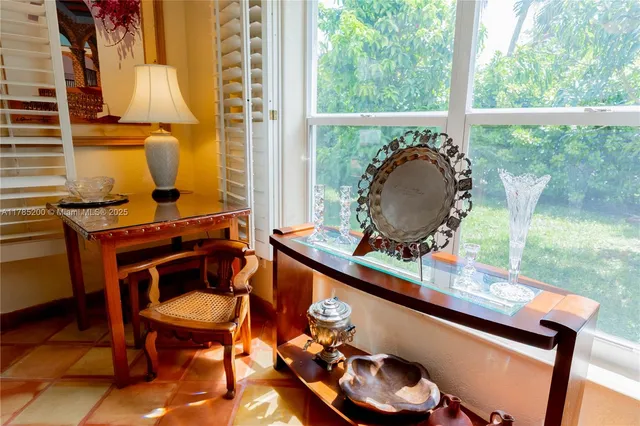 a room with furniture and a window