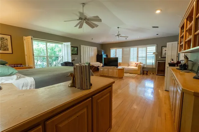a view of living room kitchen with a large window