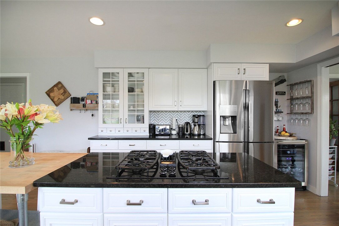 74 Sisson Pond Road Portsmouth, RI 02871 - Photo 10 of 39 Updated kitchen features new appliances.
