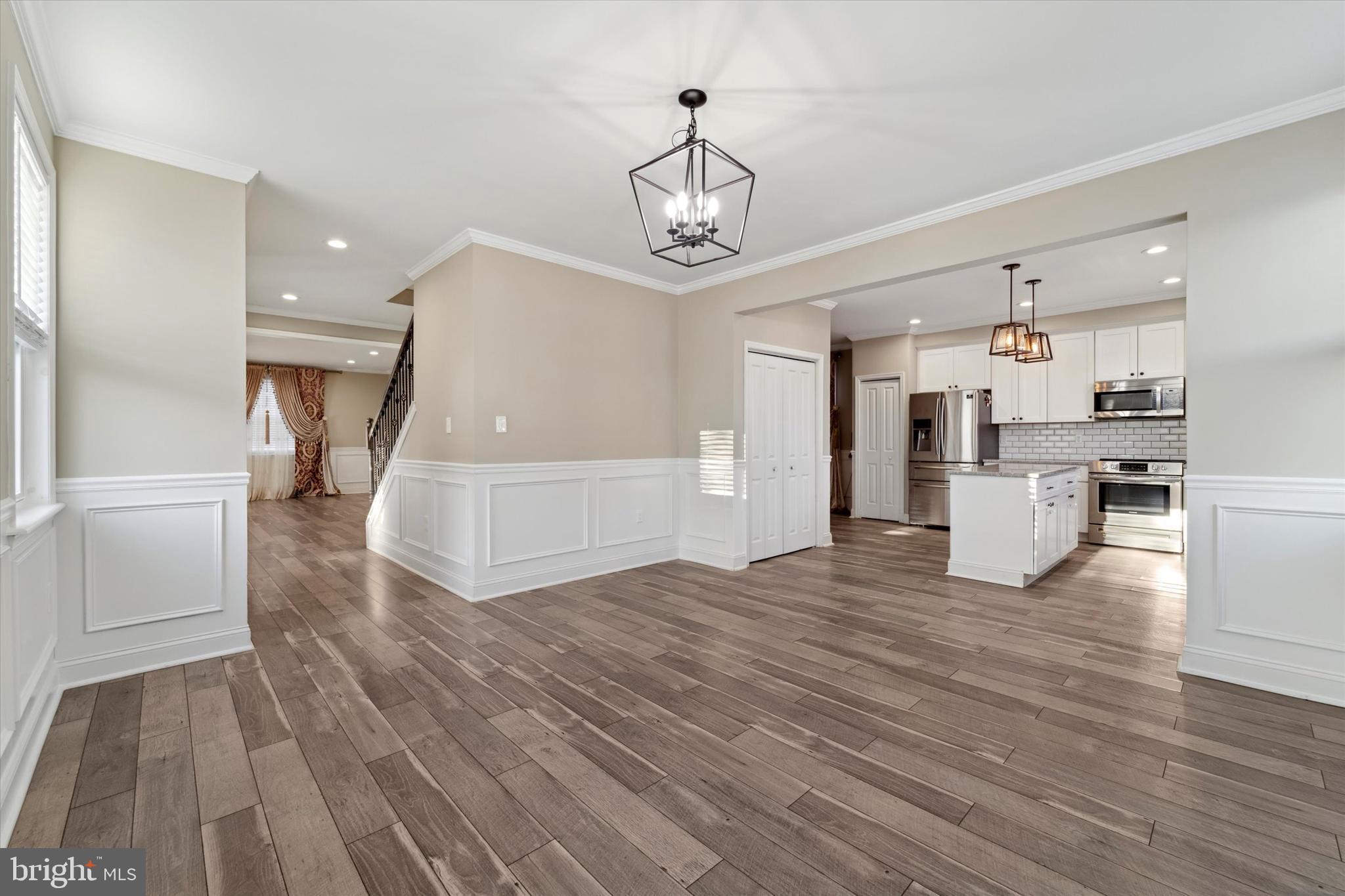 341 Date Street Warminster, PA 18974 - Photo 7 of 33 a view of a kitchen with wooden floor and windows