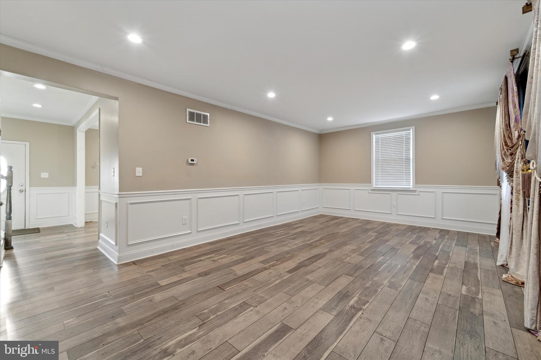 341 Date Street Warminster, PA 18974 - Photo 8 of 33 a view of an empty room with wooden floor