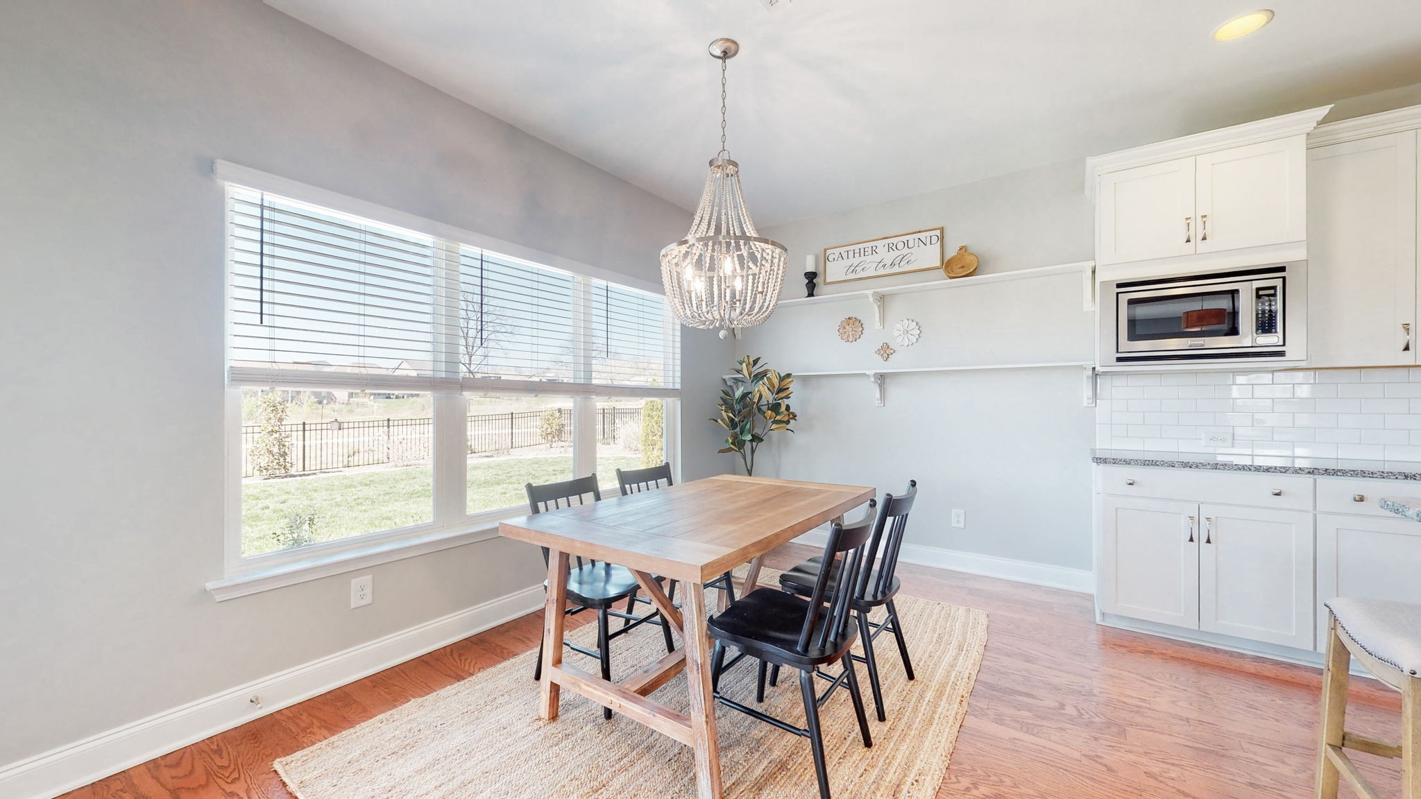 123 Monarchos Drive Gallatin, TN 37066 - Photo 13 of 55 a view of a dining room with furniture window and wooden floor