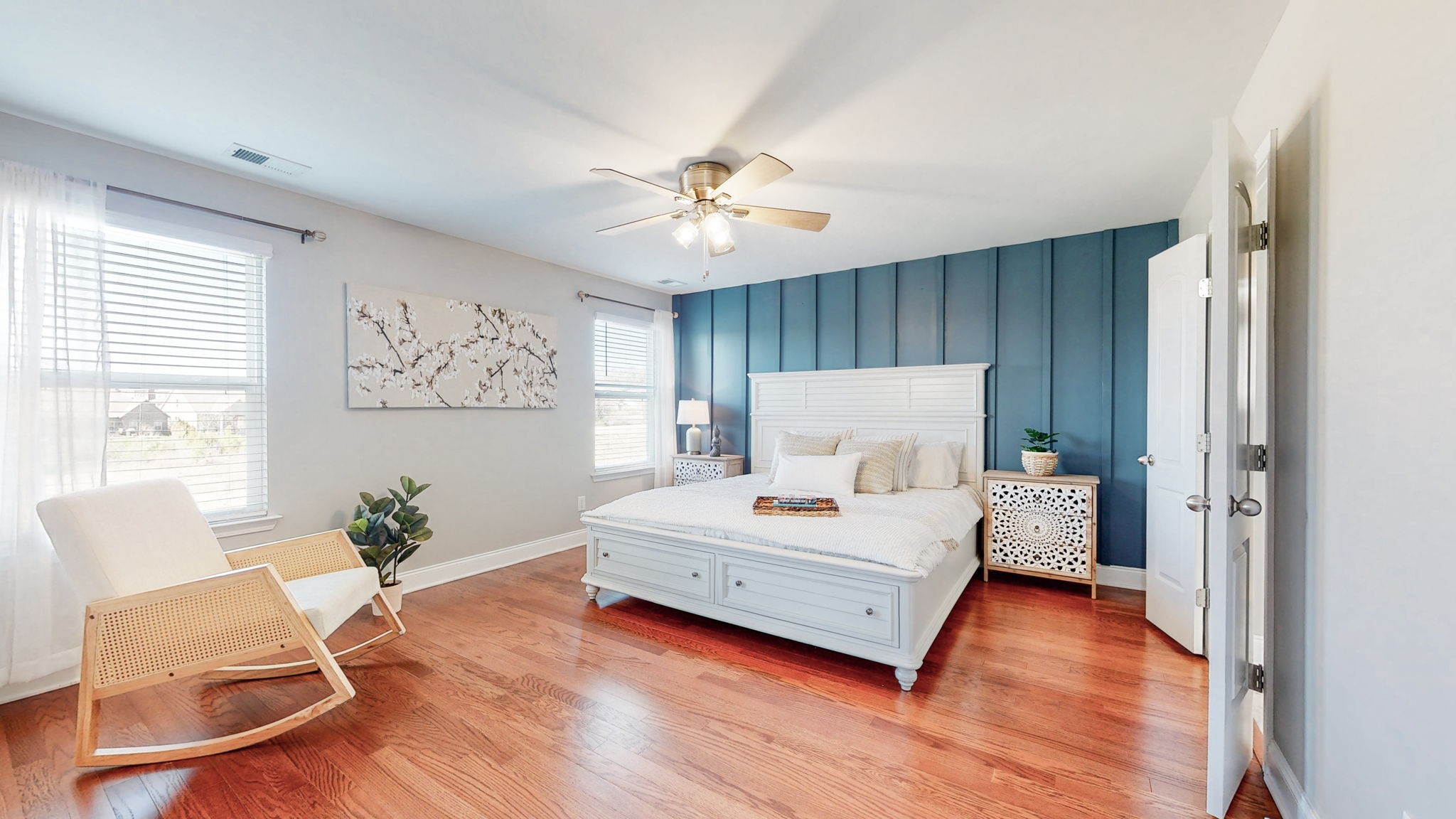 123 Monarchos Drive Gallatin, TN 37066 - Photo 24 of 55 a spacious bedroom with a bed and a chair in it