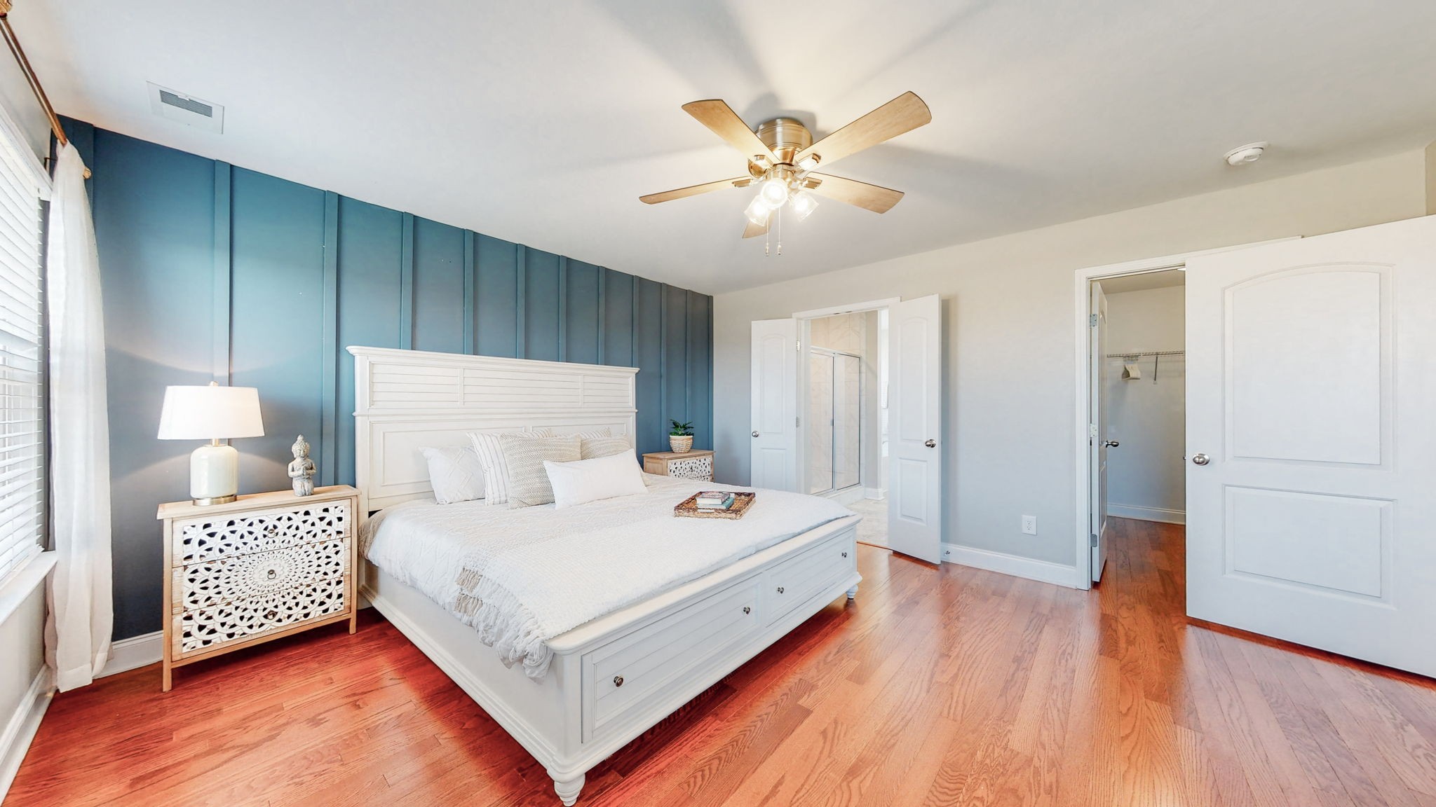 123 Monarchos Drive Gallatin, TN 37066 - Photo 26 of 55 a bedroom with a bed and a chandelier