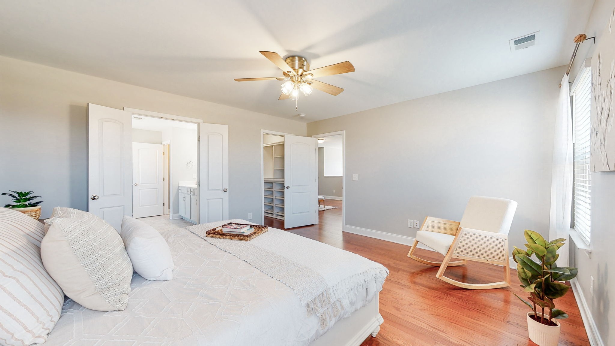 123 Monarchos Drive Gallatin, TN 37066 - Photo 27 of 55 a bedroom with a bed and a chandelier