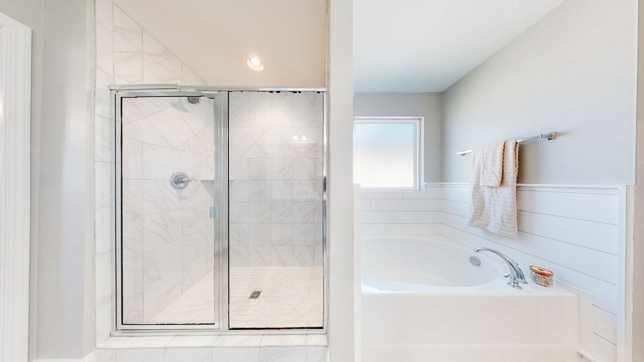 123 Monarchos Drive Gallatin, TN 37066 - Photo 30 of 55 a bathroom with a bathtub and a shower