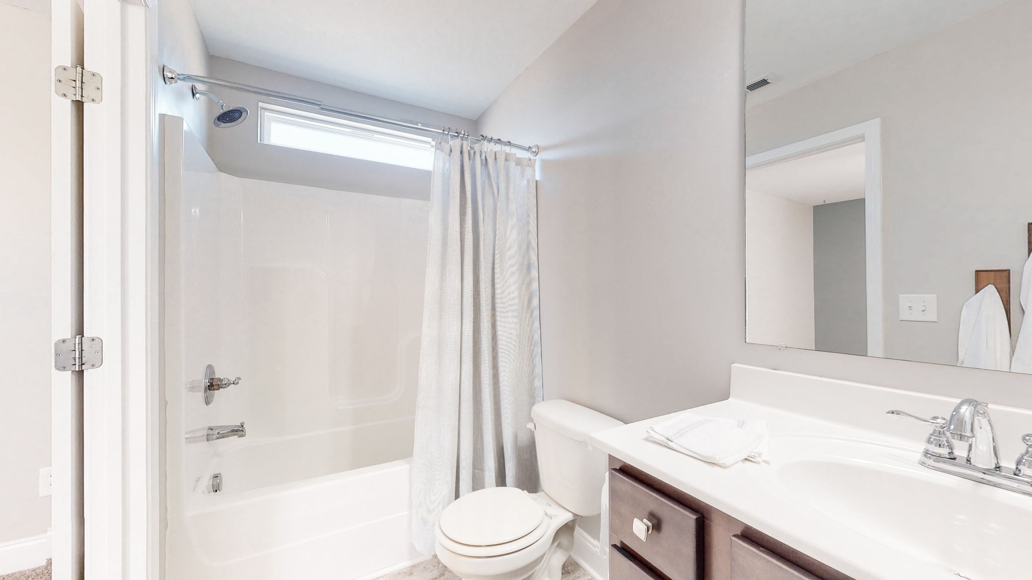 123 Monarchos Drive Gallatin, TN 37066 - Photo 34 of 55 a bathroom with a sink a toilet a mirror a vanity and shower