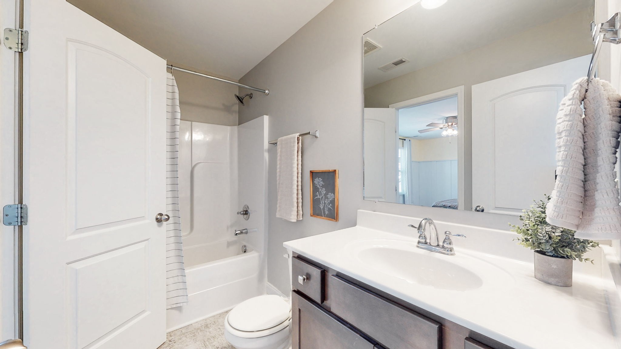 123 Monarchos Drive Gallatin, TN 37066 - Photo 38 of 55 a bathroom with a sink toilet a shower and a mirror