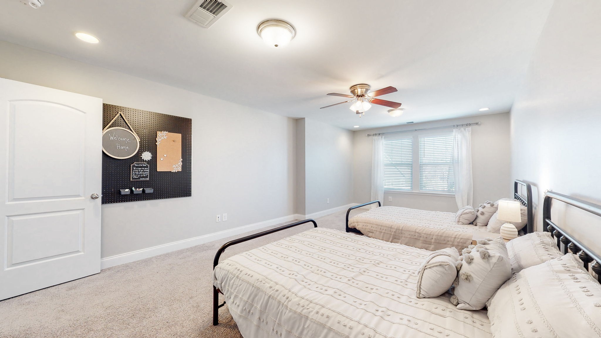 123 Monarchos Drive Gallatin, TN 37066 - Photo 39 of 55 a bedroom with a bed and a painting on the wall