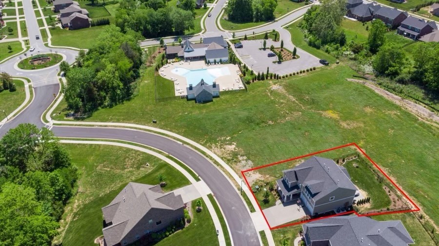 123 Monarchos Drive Gallatin, TN 37066 - Photo 4 of 55 an aerial view of a house with garden space and swimming pool