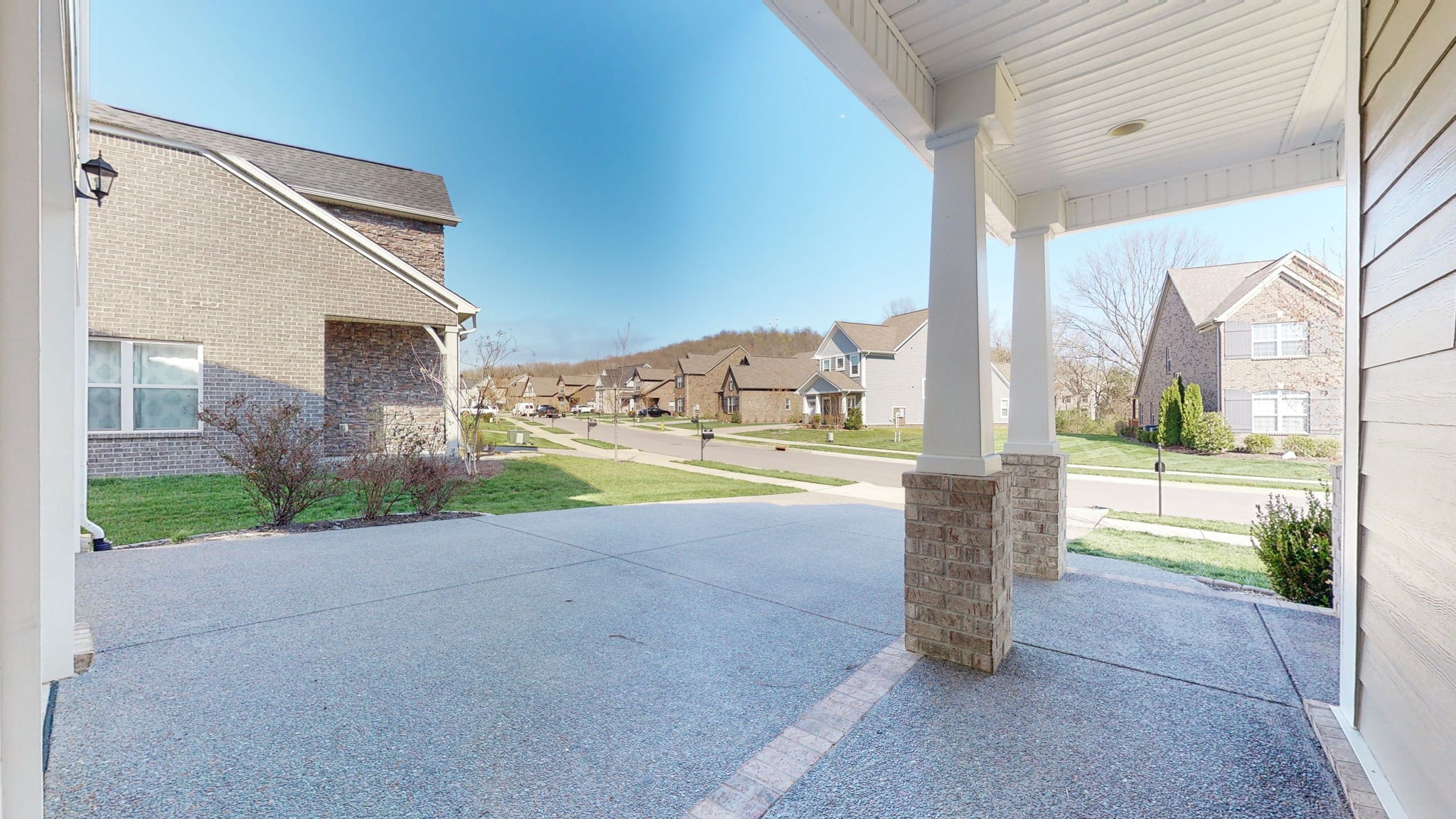 123 Monarchos Drive Gallatin, TN 37066 - Photo 44 of 55 a view of a house with a yard and porch