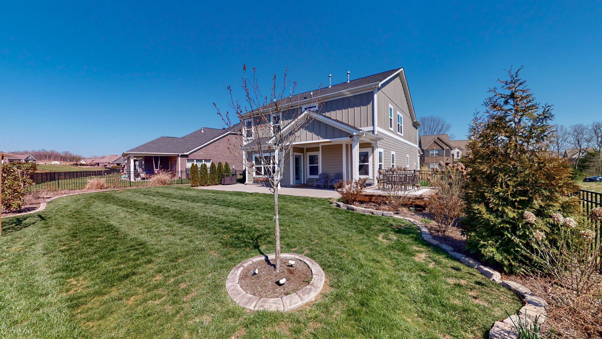 123 Monarchos Drive Gallatin, TN 37066 - Photo 48 of 55 a front view of a house with garden
