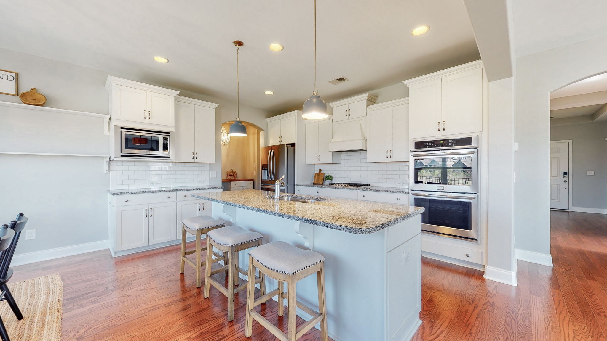 123 Monarchos Drive Gallatin, TN 37066 - Photo 7 of 55 a kitchen with a stove a sink and a refrigerator