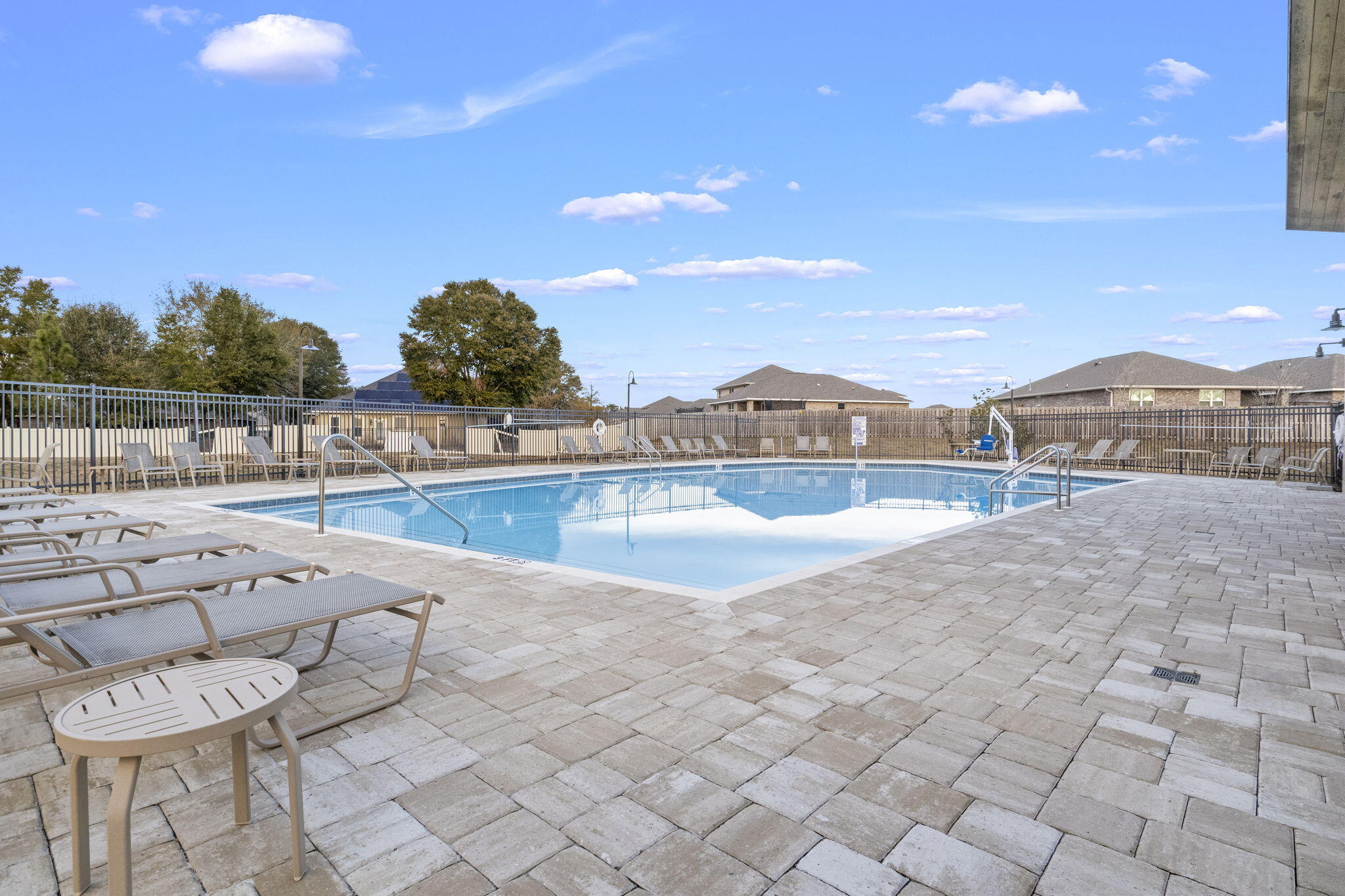 4700 Marine Loop Crestview, FL 32539 - Photo 4 of 6 a view of swimming pool with outdoor seating and plants