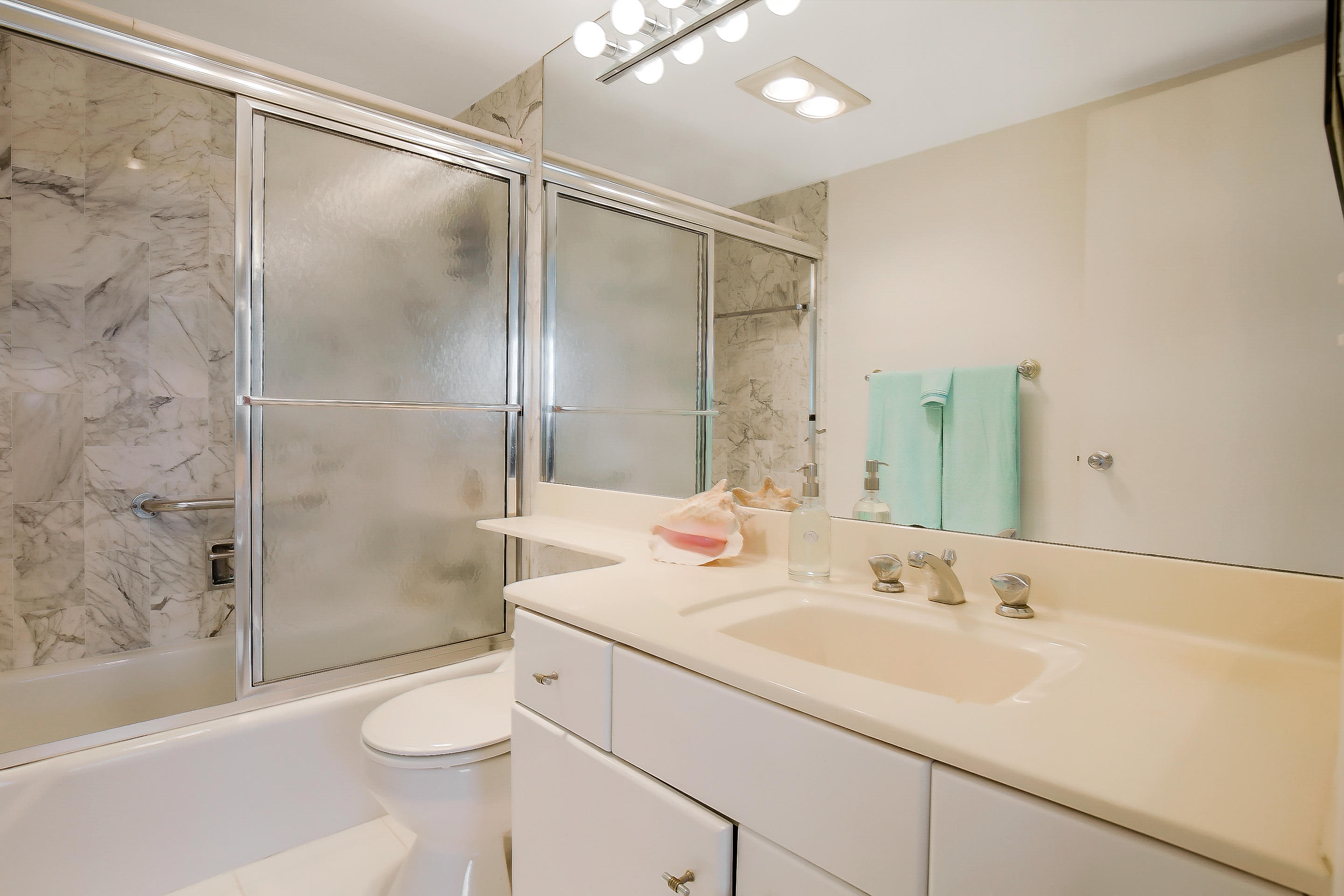 2121 North Ocean Boulevard, Unit 1201W Boca Raton, FL 33431 - Photo 15 of 56 Master bathroom