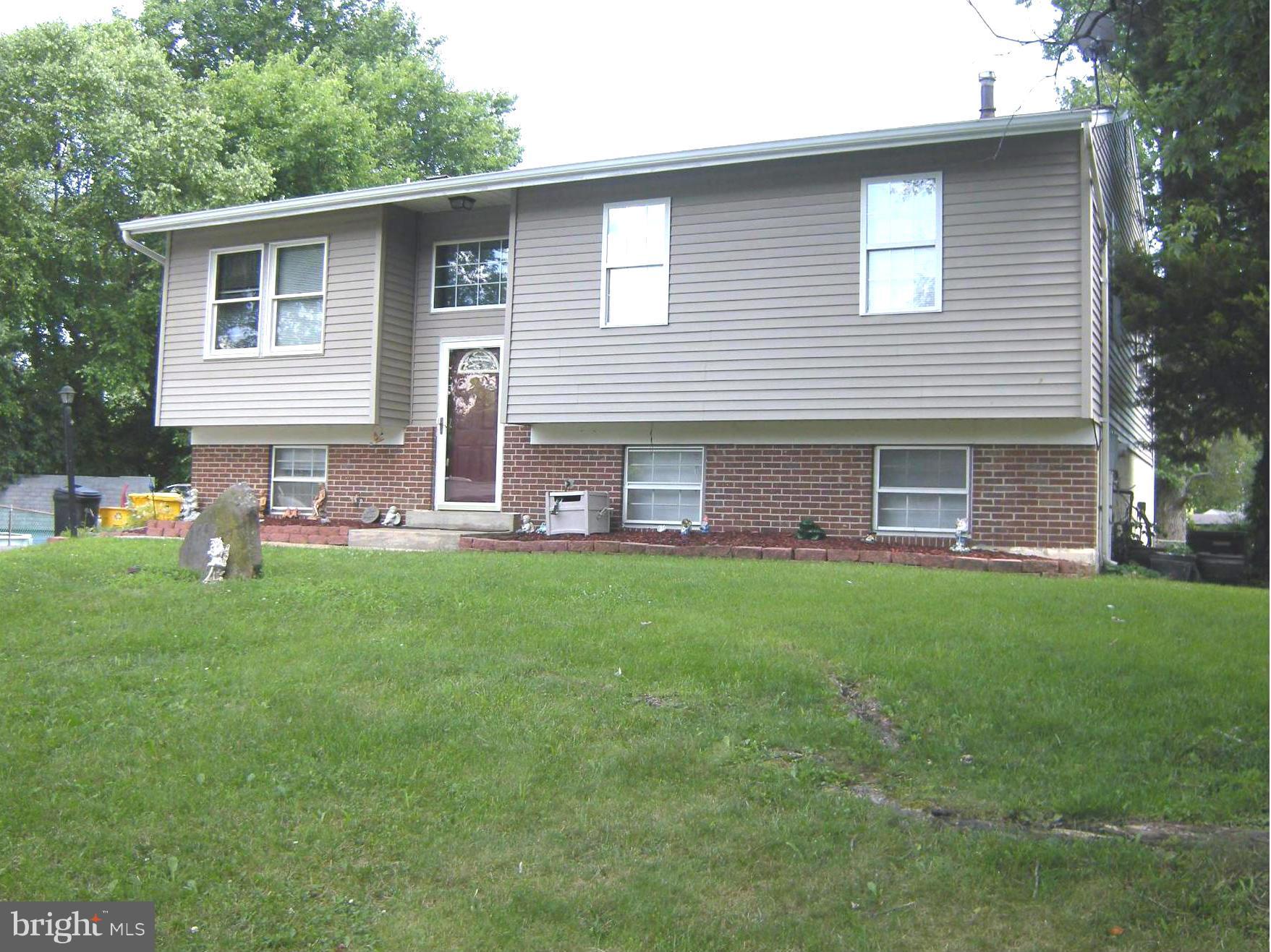 3067 Perch Drive Riva, MD 21140 - Photo 2 of 28 a front view of house with yard and outdoor seating