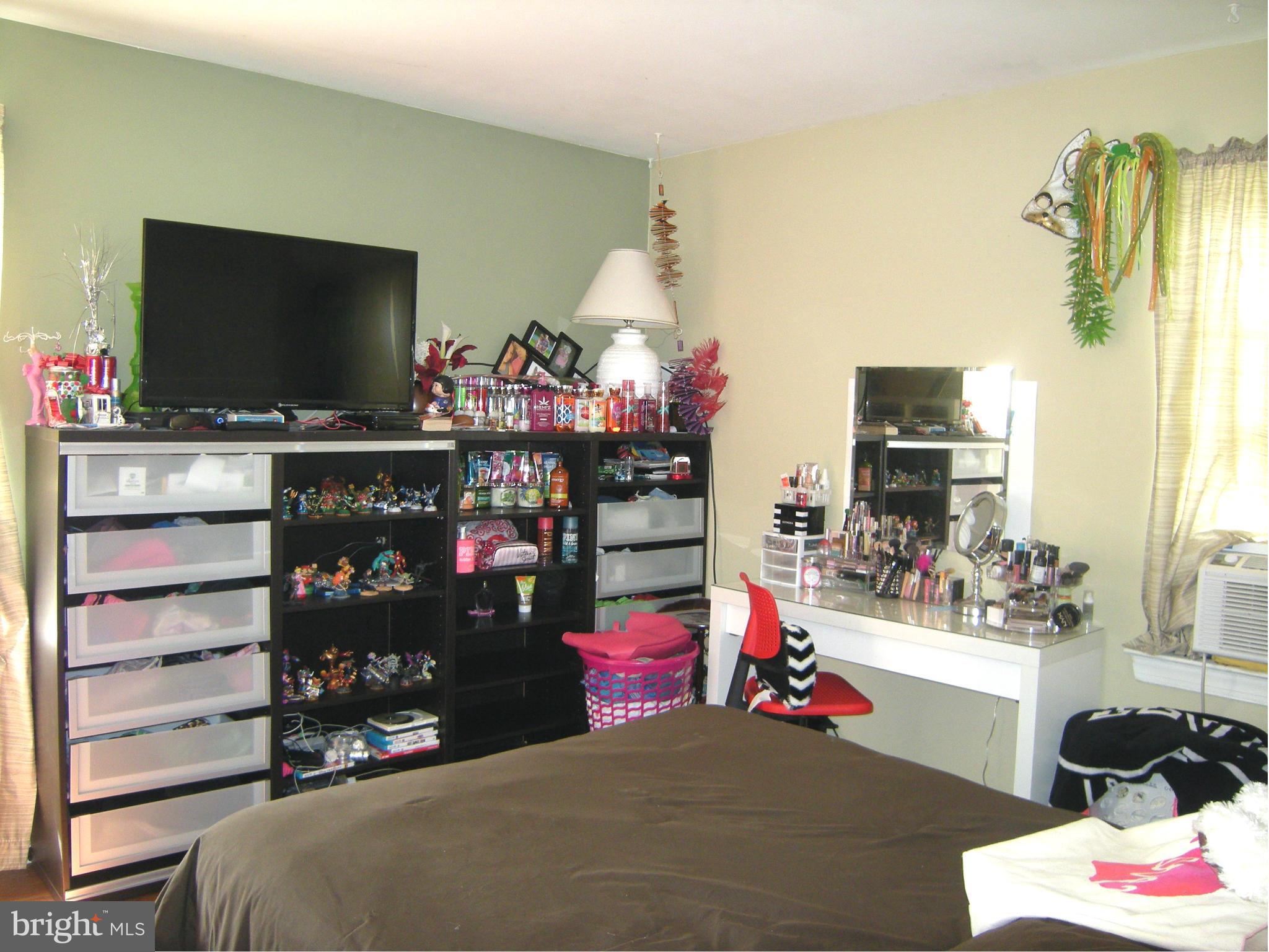 3067 Perch Drive Riva, MD 21140 - Photo 15 of 28 a bedroom with a bed and a flat screen tv