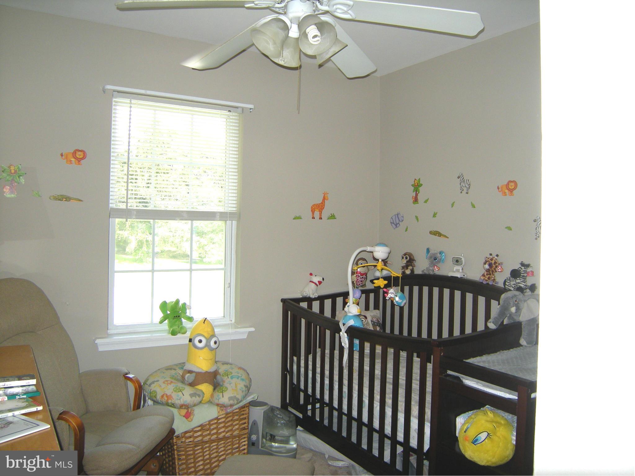 3067 Perch Drive Riva, MD 21140 - Photo 18 of 28 a bedroom with a bed and window