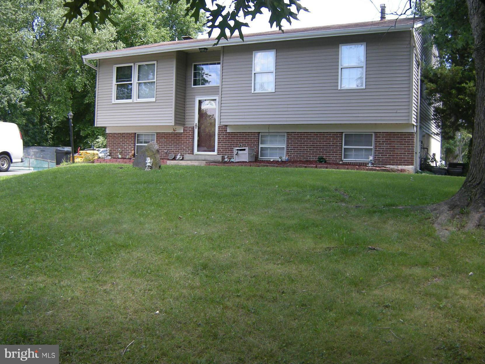 3067 Perch Drive Riva, MD 21140 - Photo 3 of 28 a front view of a house with a garden