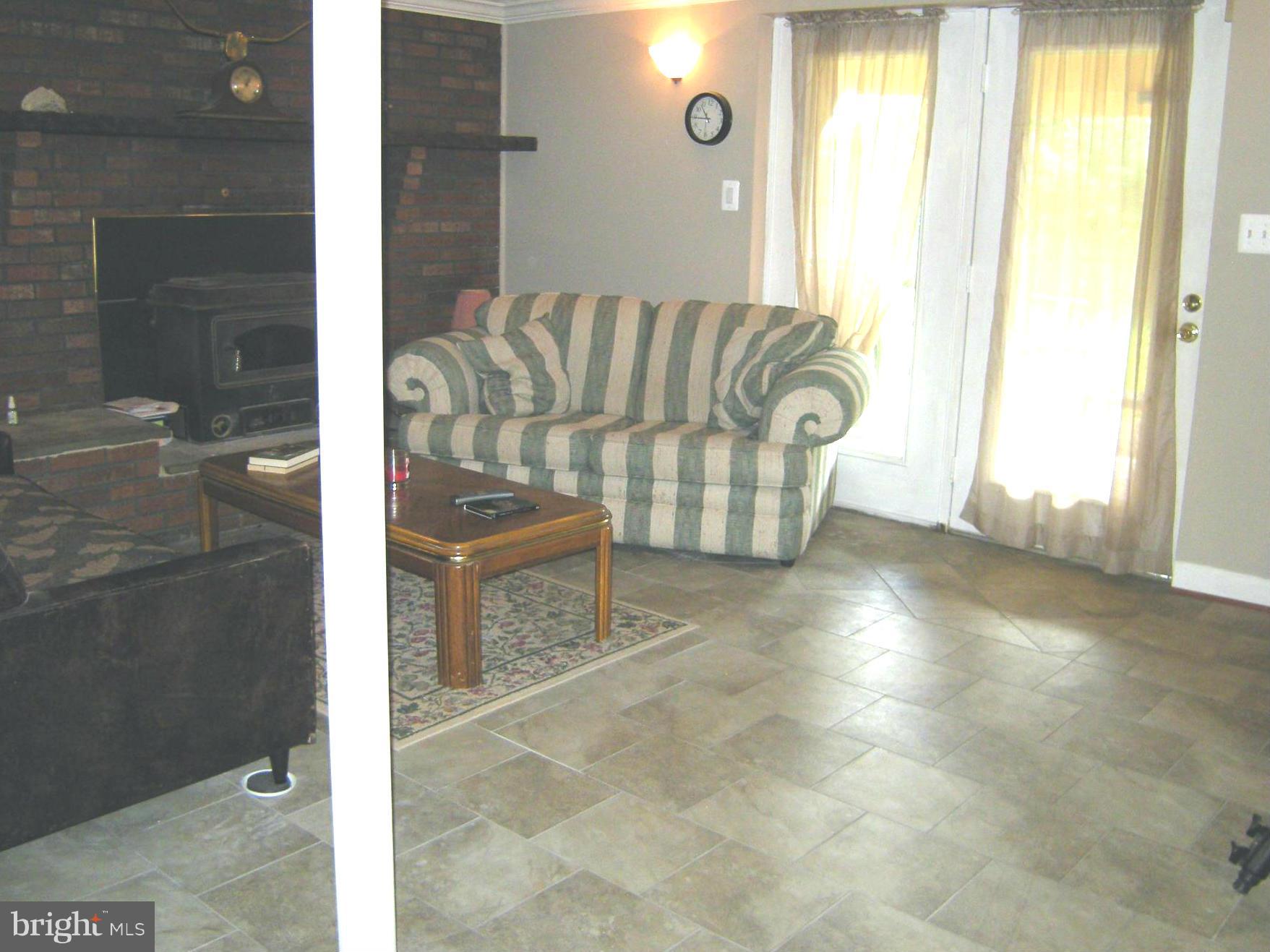 3067 Perch Drive Riva, MD 21140 - Photo 21 of 28 a living room with a couch and a table