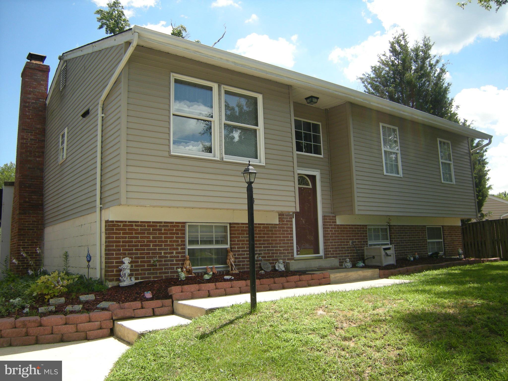 3067 Perch Drive Riva, MD 21140 - Photo 4 of 28 a backyard of a house with yard and chairs