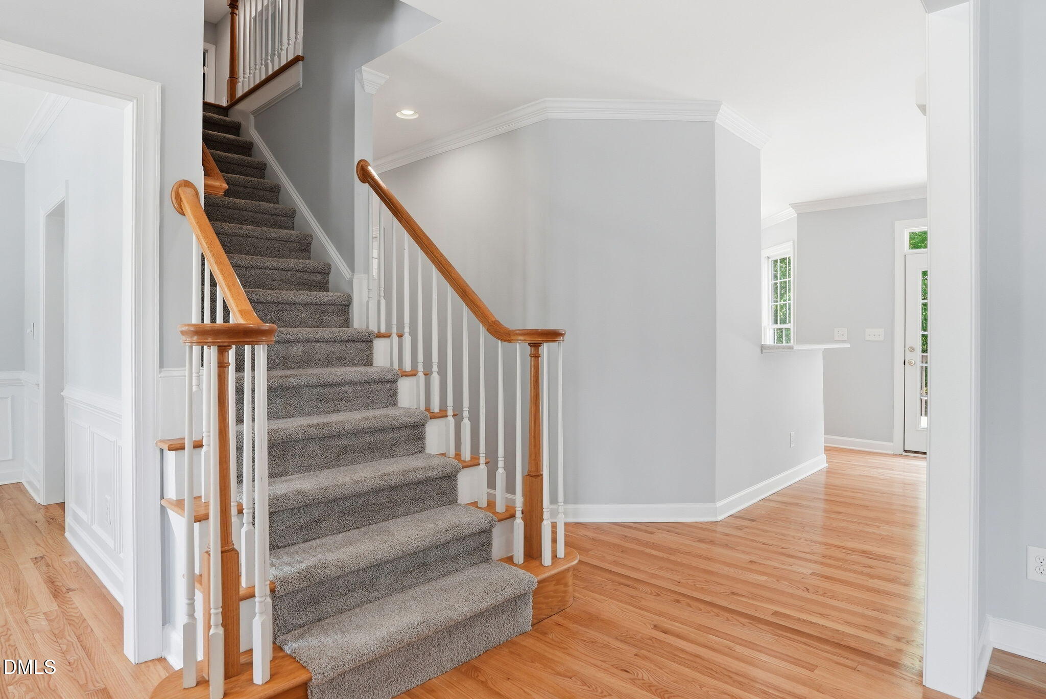 7 Morgans Ridge Lane Durham, NC 27707 - Photo 33 of 75 a view of a hallway with wooden floor and entryway