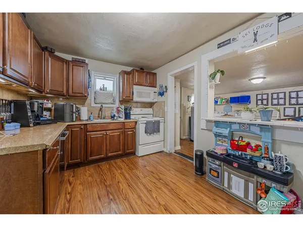 a kitchen view of counter top space and appliances