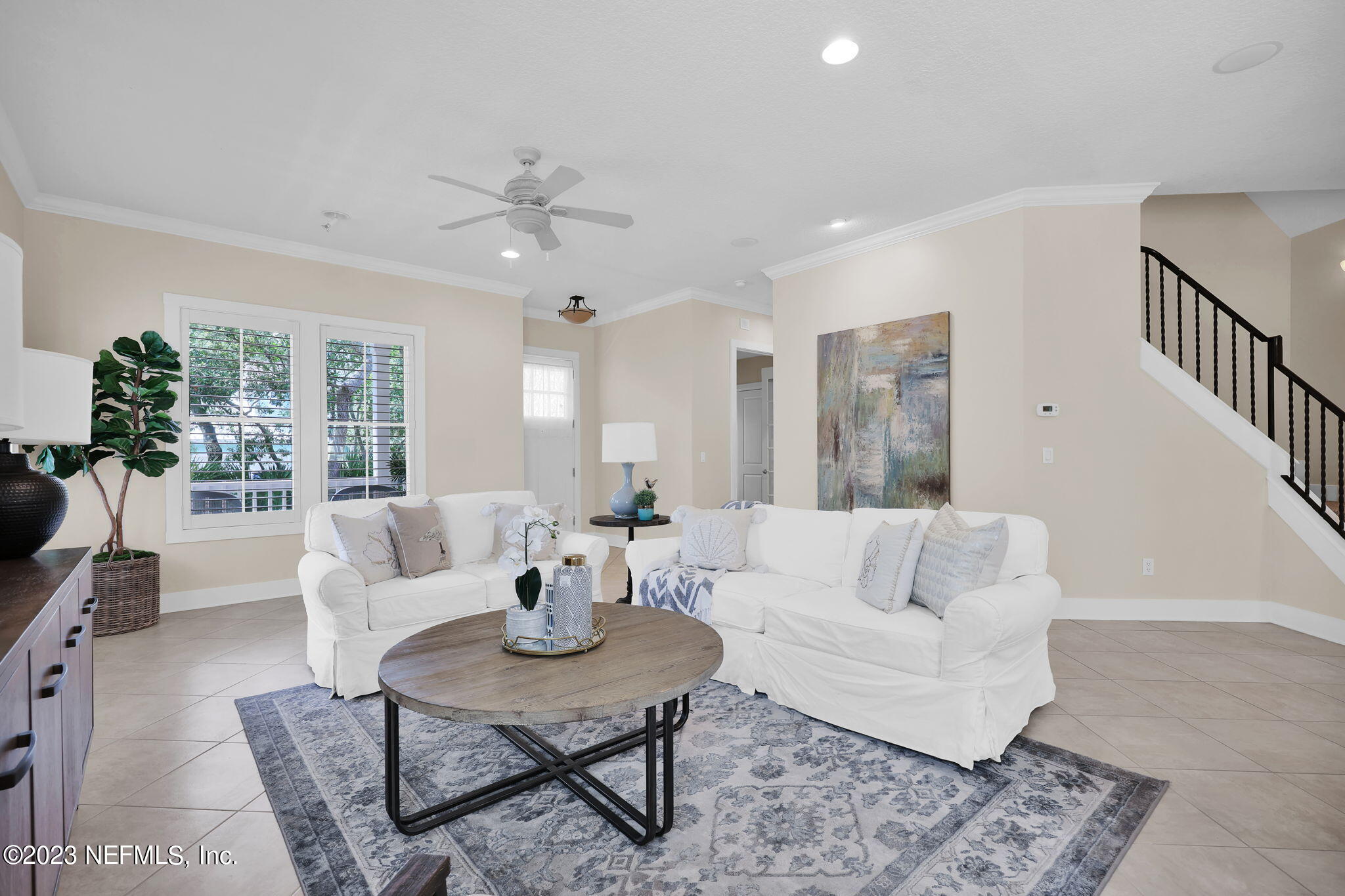 120 Istoria Drive St. Augustine, FL 32095 - Photo 12 of 90 a living room with furniture and a large window