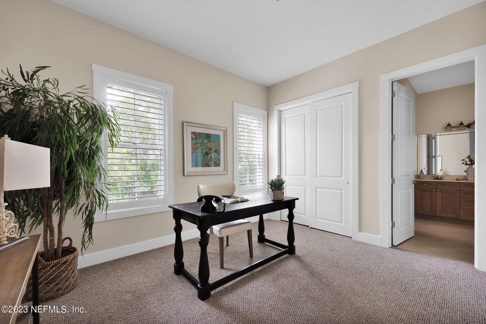 120 Istoria Drive St. Augustine, FL 32095 - Photo 16 of 90 a view of a workspace with furniture and a window