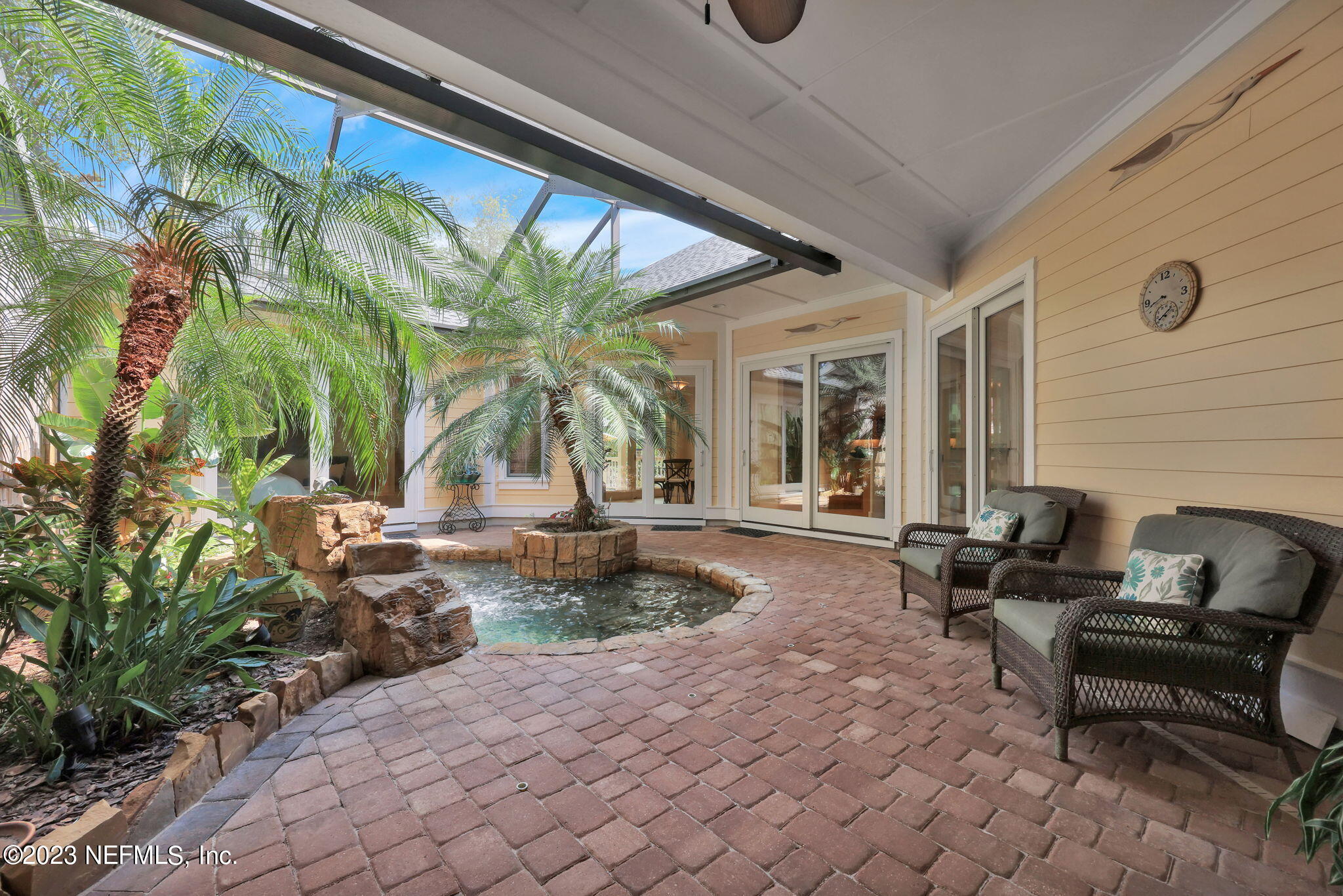 120 Istoria Drive St. Augustine, FL 32095 - Photo 20 of 90 a living room filled with furniture and a large window