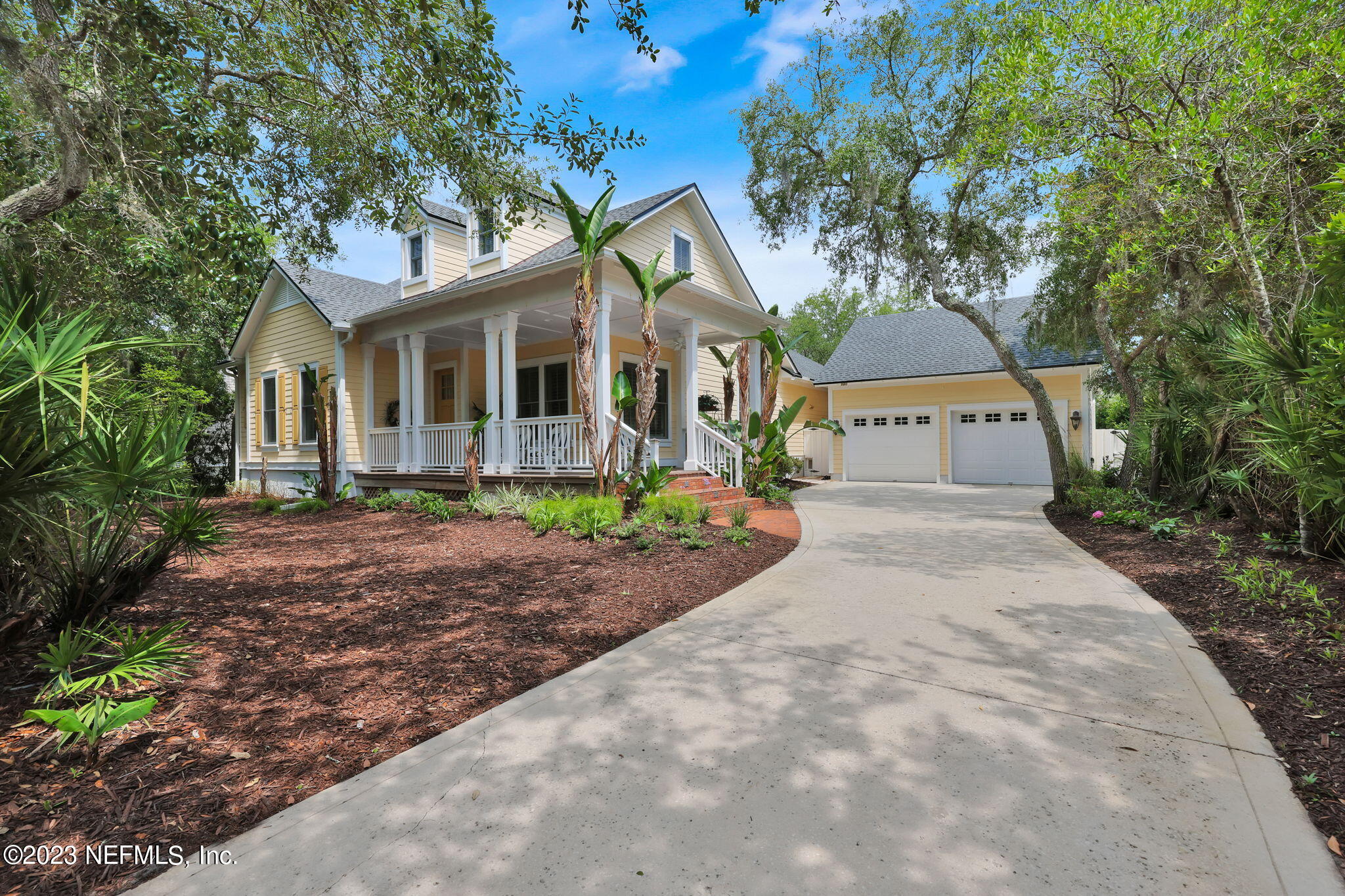 120 Istoria Drive St. Augustine, FL 32095 - Photo 2 of 90 a front view of a house with a yard and trees