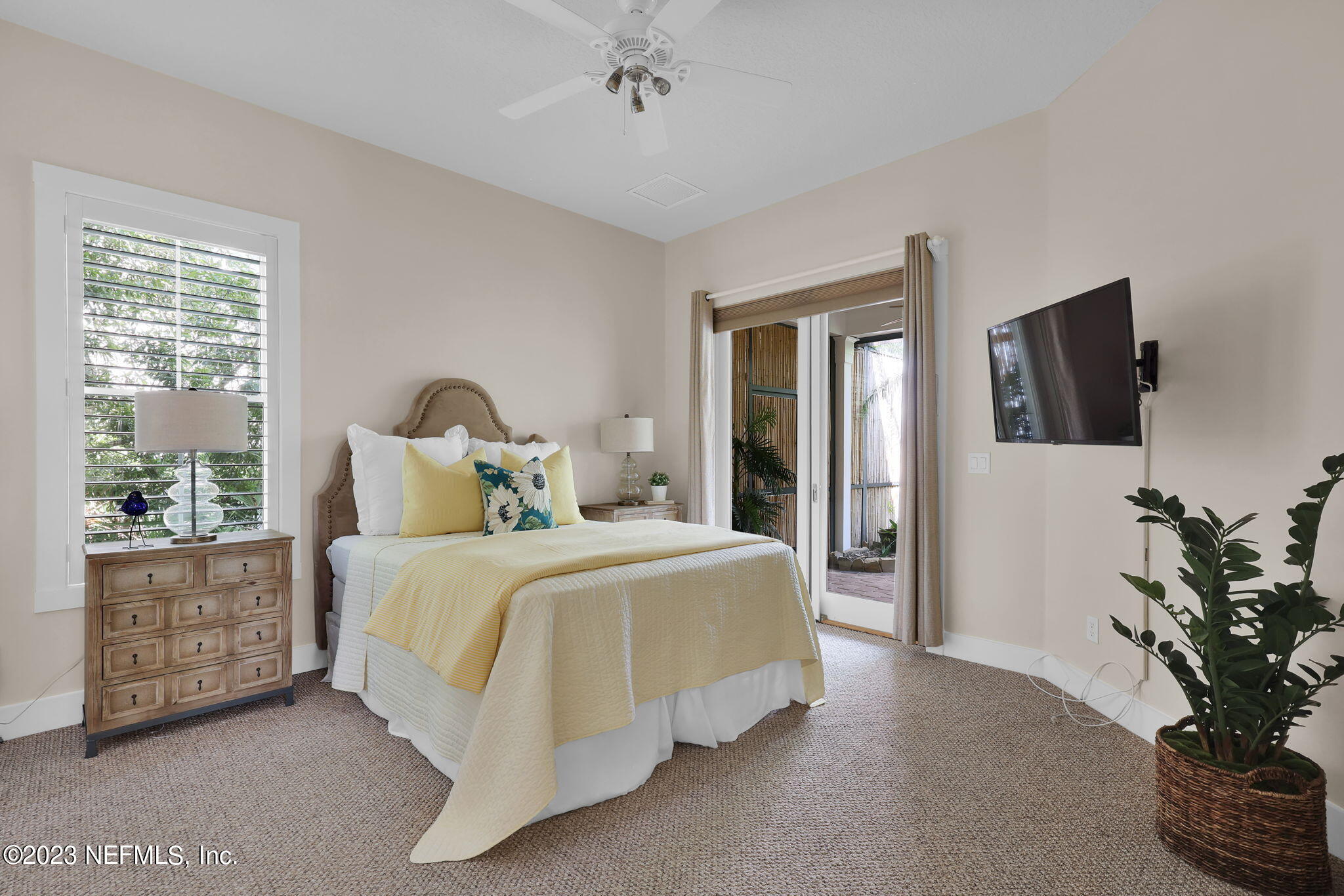 120 Istoria Drive St. Augustine, FL 32095 - Photo 43 of 90 a bed room with a bed window and a television