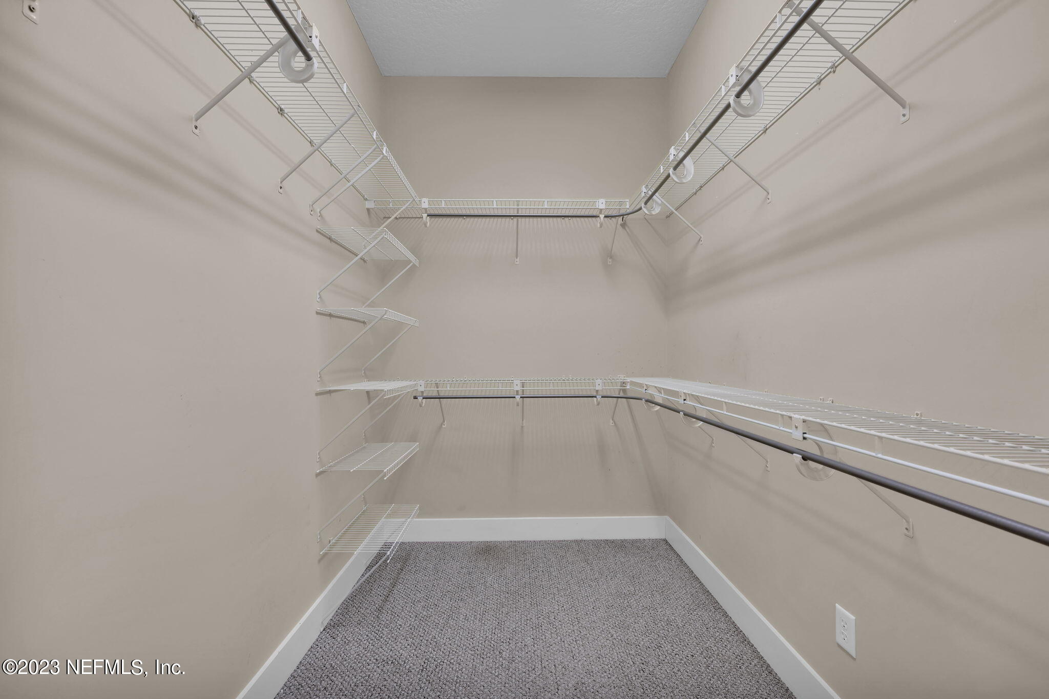 120 Istoria Drive St. Augustine, FL 32095 - Photo 49 of 90 a view of a room with racks on the wall