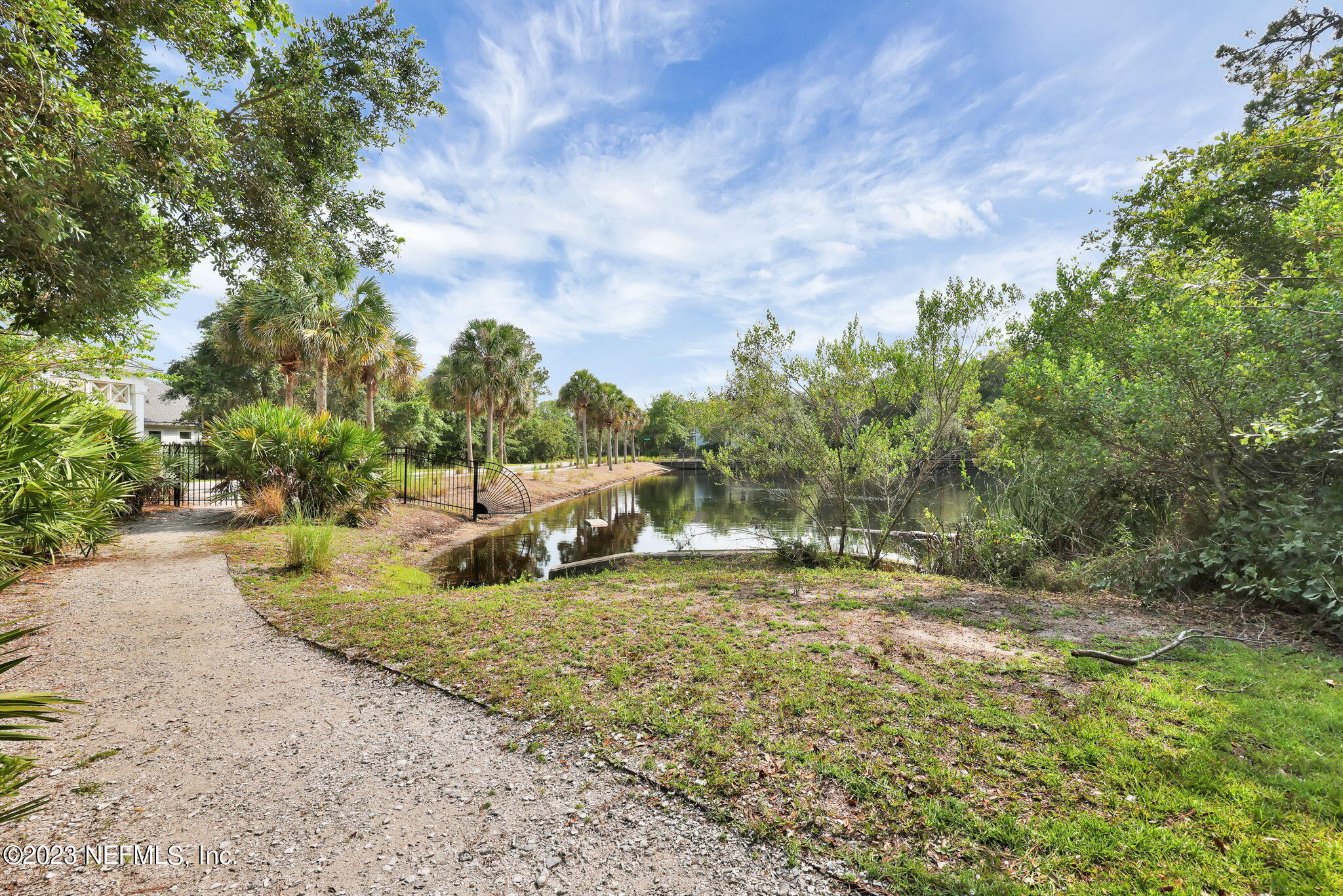 120 Istoria Drive St. Augustine, FL 32095 - Photo 74 of 90 a backyard of a house with table and chairs