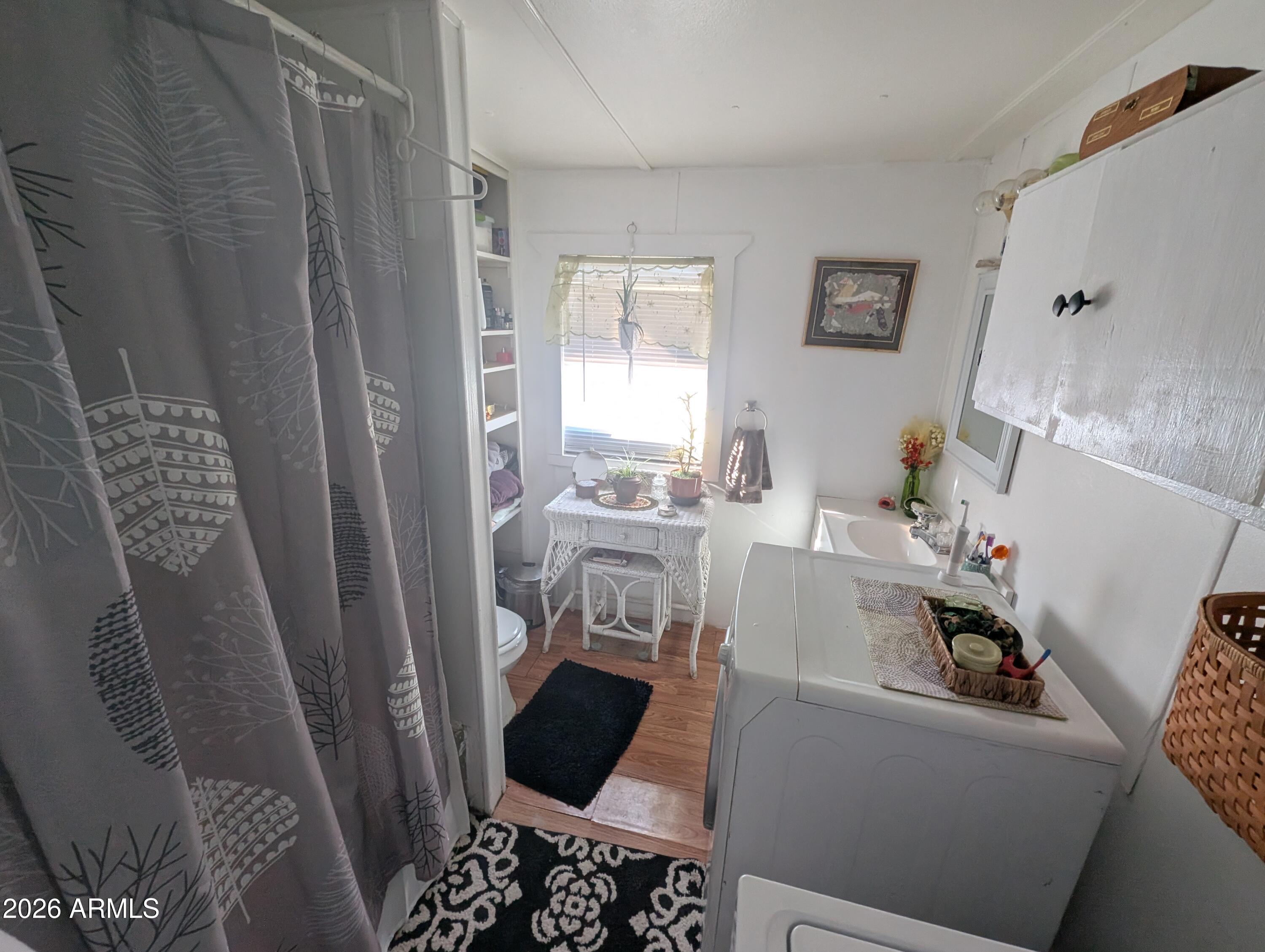 850 West Sieling Loop Bisbee, AZ 85603 - Photo 9 of 11 a living room with furniture and a window